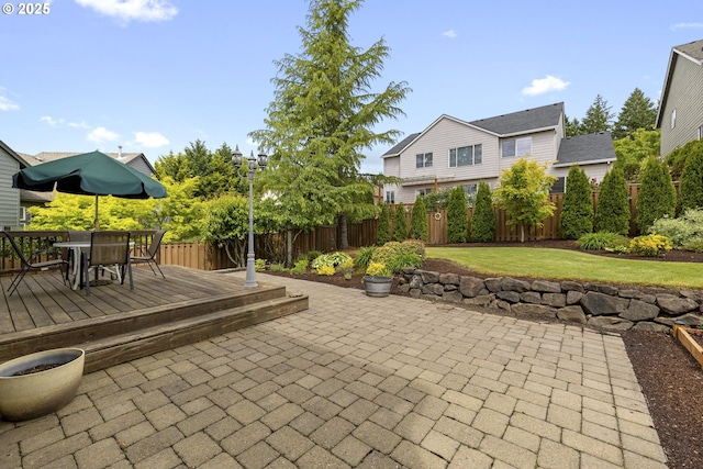 16205 SW Blackbird Dr, Beaverton, OR 97007 - view of patio featuring a wooden deck and outdoor dining area