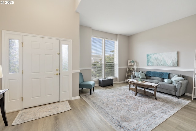 16205 SW Blackbird Dr, Beaverton, OR 97007 - living room featuring light wood-style flooring and baseboards