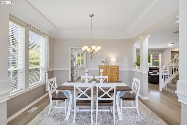 16205 SW Blackbird Dr, Beaverton, OR 97007 - dining space with wood finished floors, plenty of natural light, and a tray ceiling