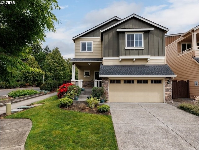 15997 NW Rossetta St, Portland, OR 97229 - craftsman-style home with stone siding, board and batten siding, driveway, and a front lawn