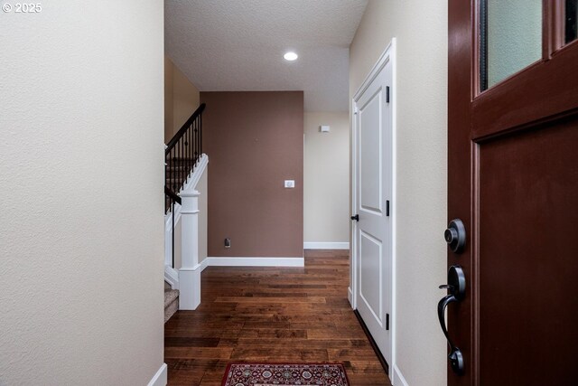 15997 NW Rossetta St, Portland, OR 97229 - foyer entrance featuring stairway, wood finished floors, recessed lighting, baseboards, and a textured ceiling