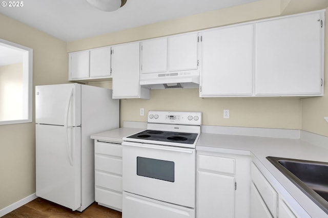 202 Trailside Loop, Eugene, OR 97405 - kitchen with white appliances, under cabinet range hood, light countertops, and white cabinets