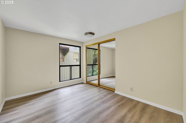 202 Trailside Loop, Eugene, OR 97405 - spare room with light wood-type flooring and baseboards