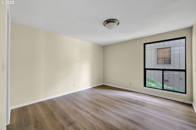 202 Trailside Loop, Eugene, OR 97405 - empty room with wood finished floors and baseboards