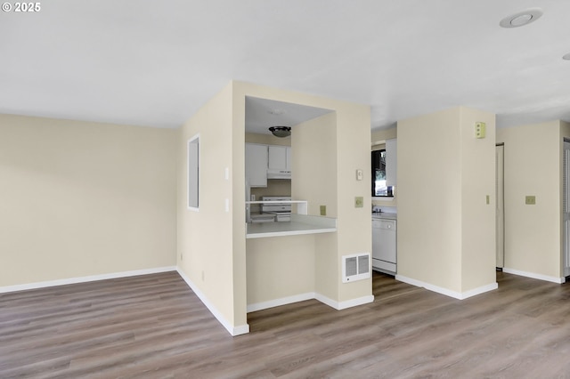 202 Trailside Loop, Eugene, OR 97405 - unfurnished living room with wood finished floors and baseboards