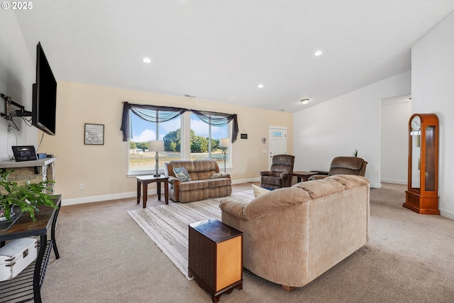 carpeted living room with vaulted ceiling