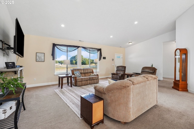 living room with carpet floors, recessed lighting, and baseboards
