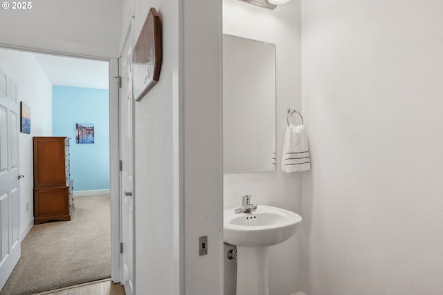 bathroom featuring baseboards