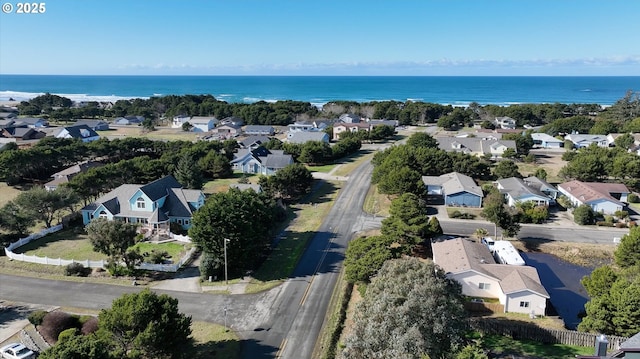 aerial view featuring a water view and a residential view