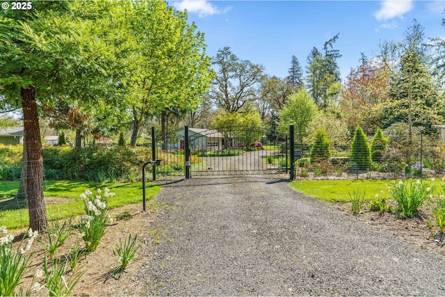 view of gate featuring fence