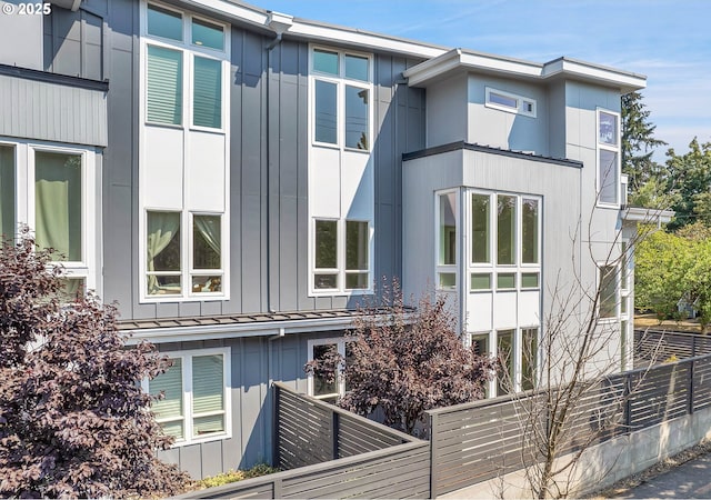 3257 NE Prescott St, Portland, OR 97211 - view of side of home featuring fence and board and batten siding