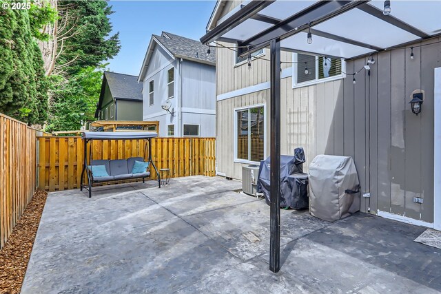 view of patio / terrace featuring a fenced backyard and grilling area