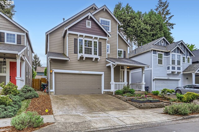 craftsman house featuring concrete driveway, a porch, and a garage