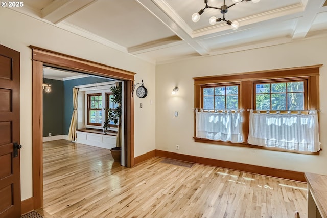 933 SE 31st Ave, Portland, OR 97214 - empty room featuring plenty of natural light, coffered ceiling, a chandelier, light wood-type flooring, and beamed ceiling