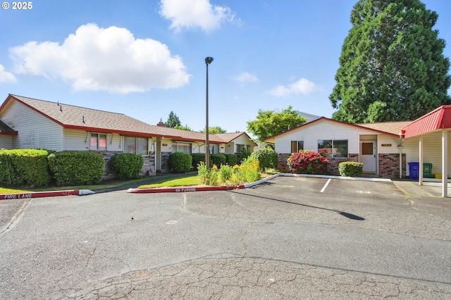 14996 SE Caruthers Ct, Portland, OR 97233 - view of property featuring uncovered parking