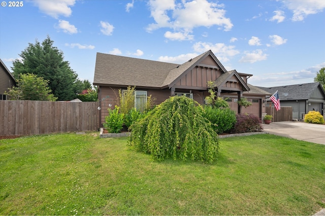 185 Lynx Ave, Aumsville, OR 97325 - view of front of property with a garage, board and batten siding, concrete driveway, and roof with shingles