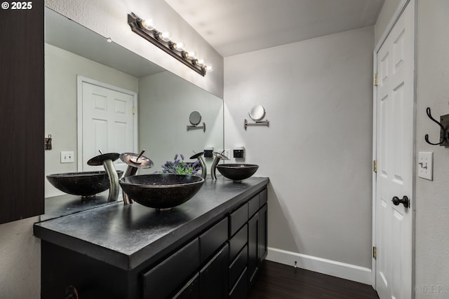 7364 SW 175th Ter, Beaverton, OR 97007 - full bath featuring double vanity, baseboards, and wood finished floors