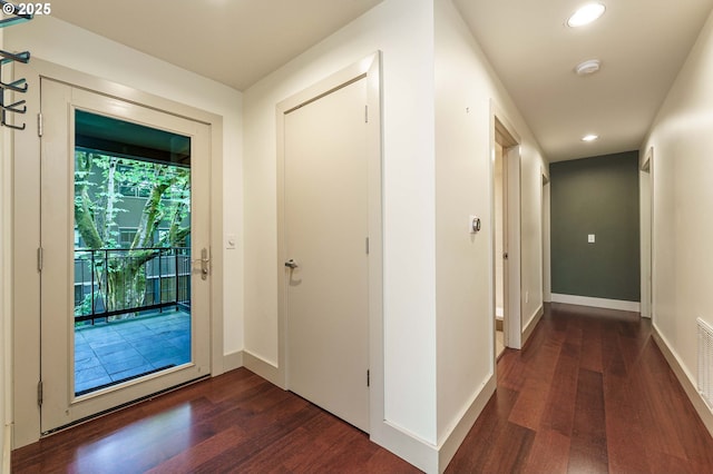 1951 NW Hoyt St, Portland, OR 97209 - corridor featuring dark wood finished floors, recessed lighting, and baseboards