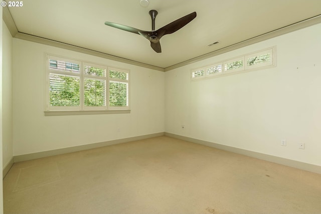 1951 NW Hoyt St, Portland, OR 97209 - spare room featuring healthy amount of natural light, ceiling fan, and light colored carpet