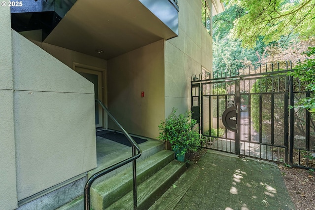 1951 NW Hoyt St, Portland, OR 97209 - entrance to property with a gate and stucco siding