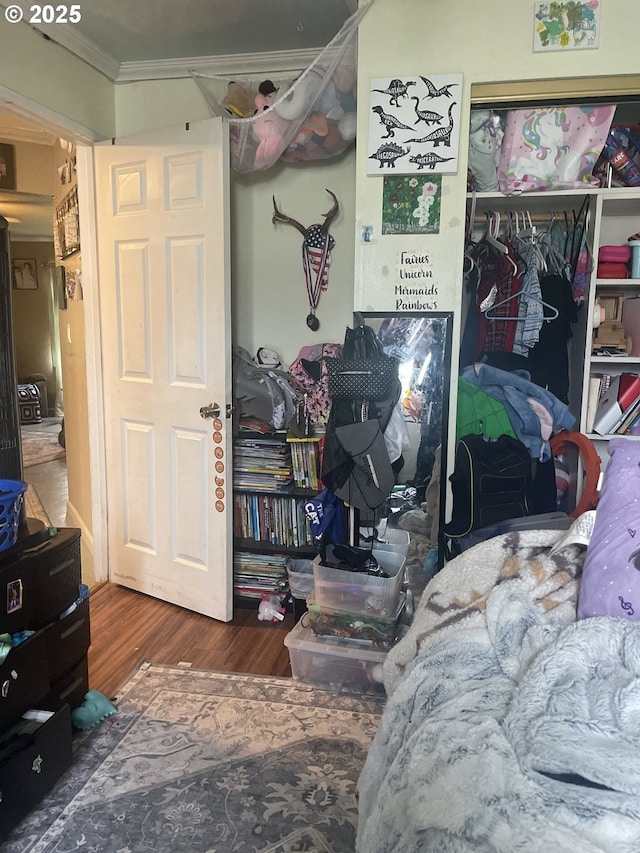 629 NE Johnson St, Myrtle Creek, OR 97457 - bedroom featuring ornamental molding, wood finished floors, and a closet