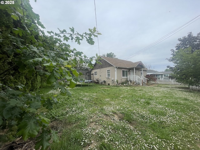 629 NE Johnson St, Myrtle Creek, OR 97457 - view of yard with a trampoline