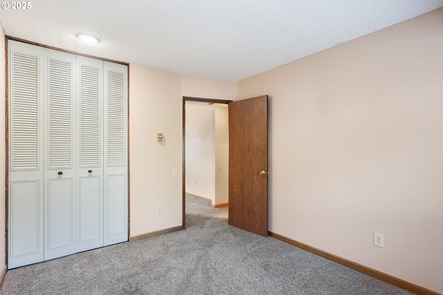 12110 SW King Arthur St, Portland, OR 97224 - unfurnished bedroom with a textured ceiling, a closet, carpet flooring, and recessed lighting