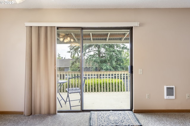 12110 SW King Arthur St, Portland, OR 97224 - entryway with carpet, plenty of natural light, and heating unit