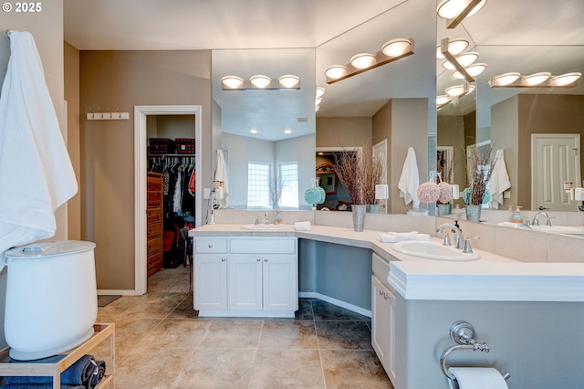 bathroom featuring vanity and tile patterned flooring