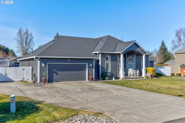 ranch-style home featuring a garage and a front lawn