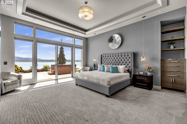 794 S A St, Washougal, WA 98671 - bedroom featuring a raised ceiling, access to exterior, carpet flooring, a high ceiling, and a water view