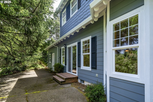 110 SW 61st St, South Beach, OR 97366 - view of side of property featuring a patio area