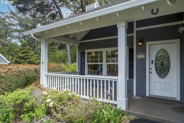 110 SW 61st St, South Beach, OR 97366 - doorway to property with a porch