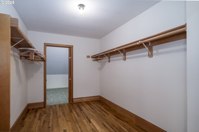 110 SW 61st St, South Beach, OR 97366 - walk in closet with wood finished floors