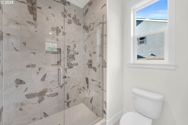 5591 N 93rd Ave Unit Lt206, Camas, WA 98607 - bathroom featuring a shower stall, baseboards, and toilet