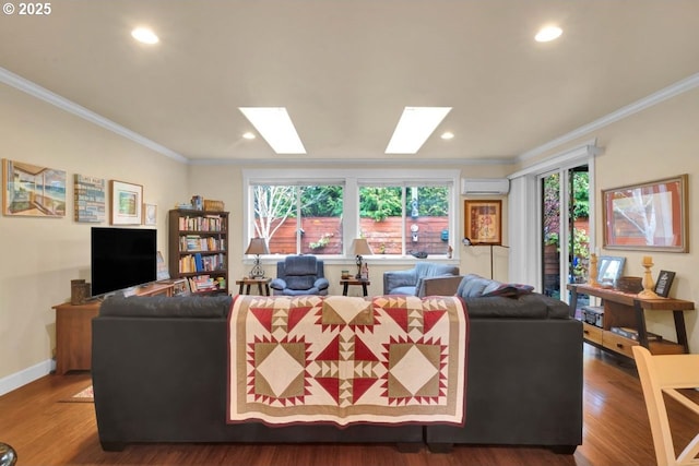 living area featuring ornamental molding, an AC wall unit, and wood finished floors