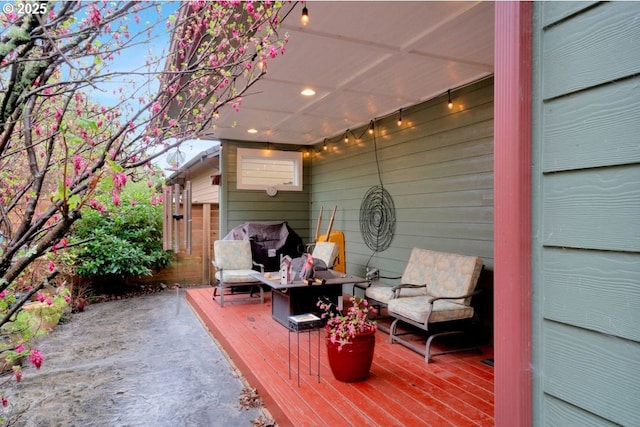 deck with outdoor lounge area