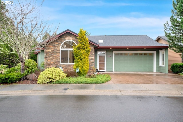 ranch-style house with concrete driveway, a garage, and stone siding