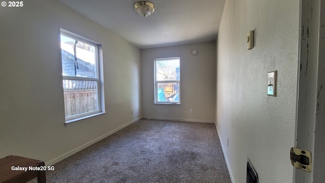 3730 N Albina Ave, Portland, OR 97227 - unfurnished room featuring healthy amount of natural light, carpet, and baseboards