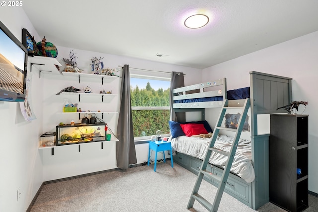 carpeted bedroom with visible vents