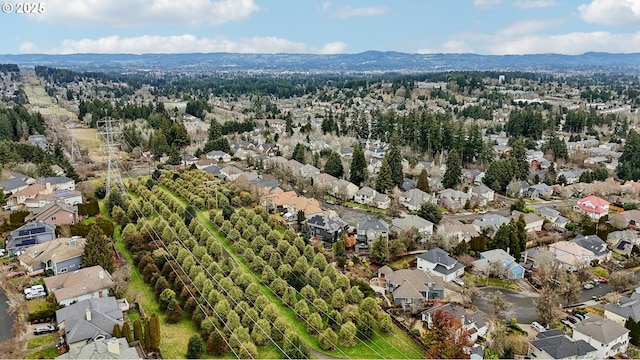 bird's eye view featuring a mountain view and a residential view