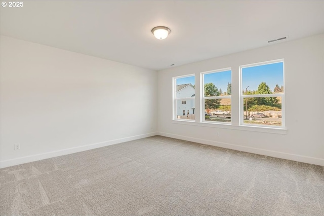 empty room featuring carpet floors