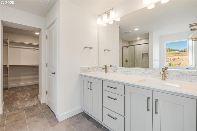 bathroom featuring vanity and walk in shower