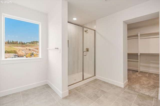 bathroom featuring walk in shower