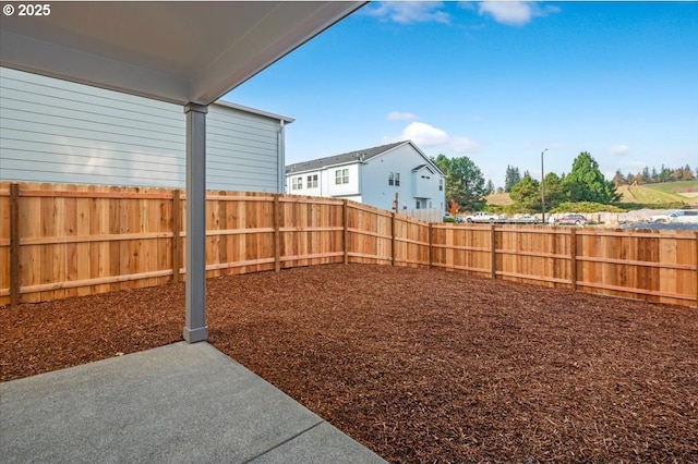 view of yard with a patio area