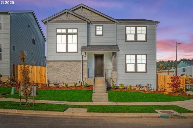 view of front of home featuring a yard