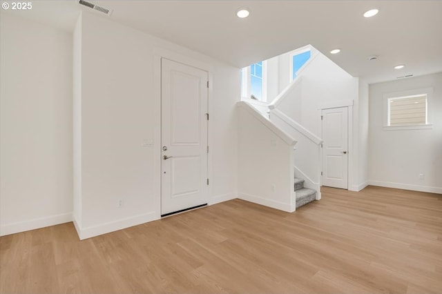 foyer entrance featuring light hardwood / wood-style floors