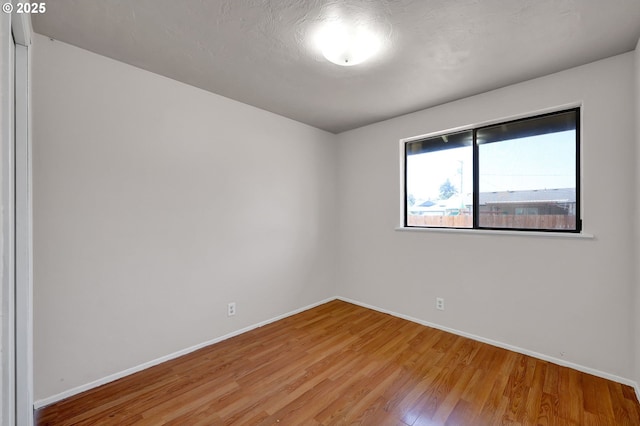 5430 E St, Springfield, OR 97478 - empty room featuring baseboards and light wood-type flooring