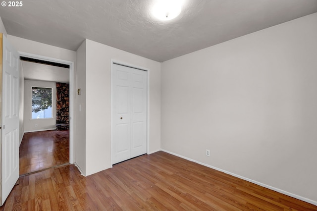 5430 E St, Springfield, OR 97478 - unfurnished bedroom with light wood-type flooring and a closet
