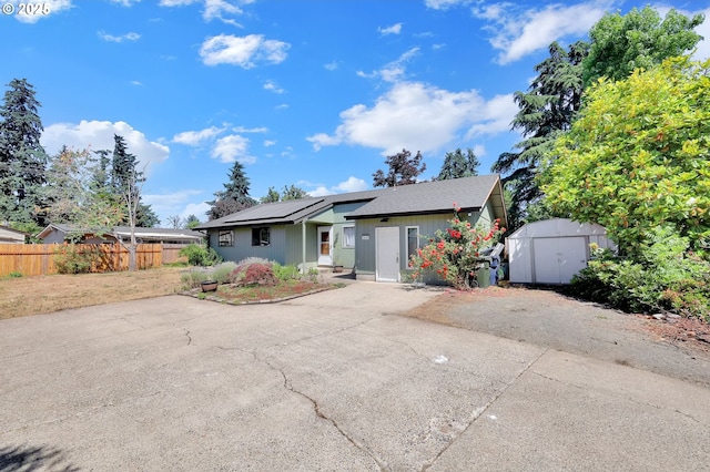 5430 E St, Springfield, OR 97478 - ranch-style home with a storage shed and solar panels